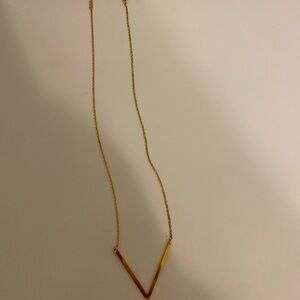 V gold necklace